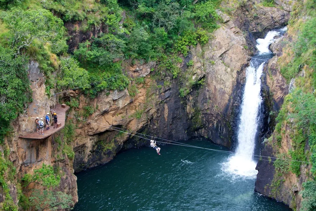 Aerial view of tourists zip lining Magoebaskloof canopy tours in Tzaneen