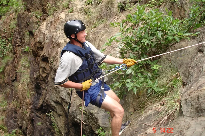 Male tourist abseiling with Magoebaskloof Adventures in Tzaneen alternate view 2