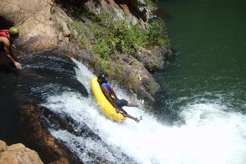 Tourists gecko tubing in a river with Magoebaskloof Adventures