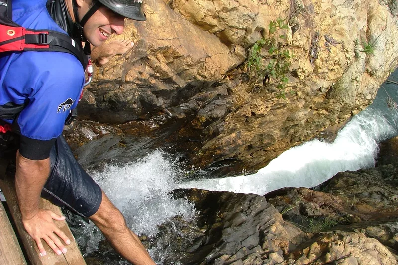 Male tourist smiling kloofing with Magoebaskloof Adventures in Tzaneen